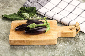 Small few baby eggplant over board