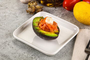 Whole grilled avocado with salmon