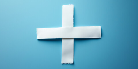 Obraz premium Two large white plasters forming a cross in cartoon style