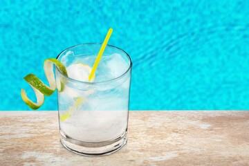 Glass of tasty alcohol drink at resort hotel