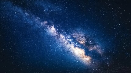Fototapeta premium A stunning night sky filled with stars, the Milky Way Galaxy is a bright band of light stretching across the sky.