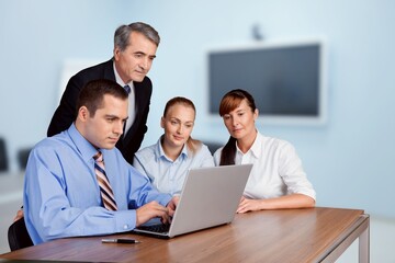 Happy motivated business team brainstorming in office