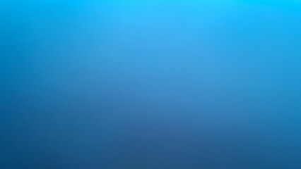 A simple,solid blue metallic background with blurry gradient