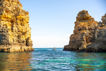 natural background of rock and ocean. Rocks in the Algarve region, Portugal 
