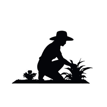 recommend clip art: A silhouette of a farmer or gardener working in a field or garden