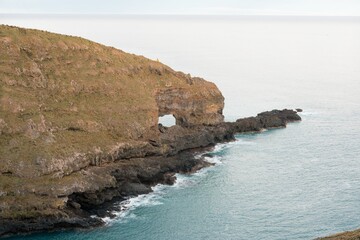 Hole in the Rock at Akaroa Head Scenic Reserve Cliffs - Dramatic Coastal Formation