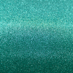 Glamorous glittering Background texture with sequins. Tiffany color.