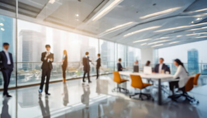 Business professionals engage in discussion and collaboration in a modern office with a city skyline view during daylight