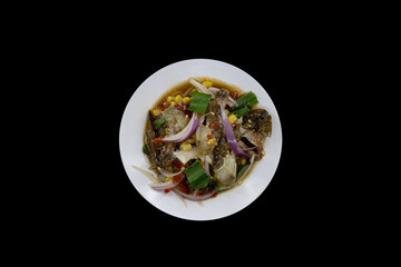 Crab in Fish-Sauce Marinated, top view isolated on black background with clipping path.
