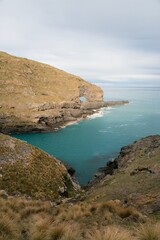 Hole in the Rock at Akaroa Head Scenic Reserve Cliffs - Natural Coastal Formation