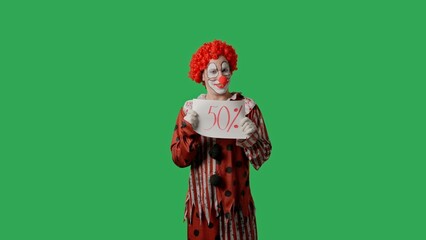 Funny clown on green screen chroma key.
