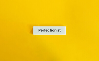 Perfectionist Word and Banner. Text on Block Letter Tile on Yellow Background. Minimal Aesthetic.