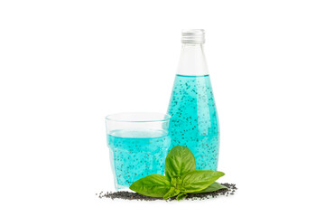 Diet detox cocktail with basil and chia seeds in glass jar and glass isolated on white background....