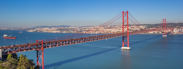 Panorama of the Ponte 25 de Abril bridge in Lisbon, Portugal