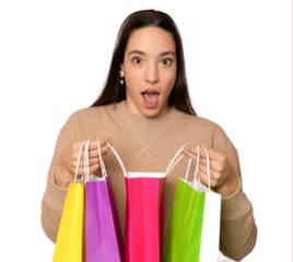 Young shopping woman happy smiling holding shopping bags isolated over transparent background. Lovely fresh young Caucasian female model.