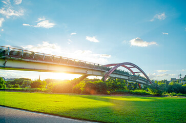 Fototapeta premium Steel bridge with sunset in Osan,Korea.