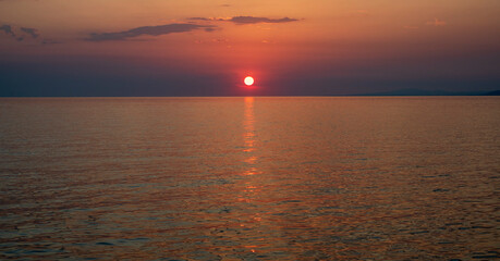 Spectacular sunset on the sea. Greece, Neos Marmaras.	