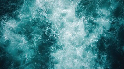 Fototapeta premium The image features intense, dark ocean waves, creating a sense of power and mystery. The texture and energy of the sea reflect nature's raw and untamed beauty.