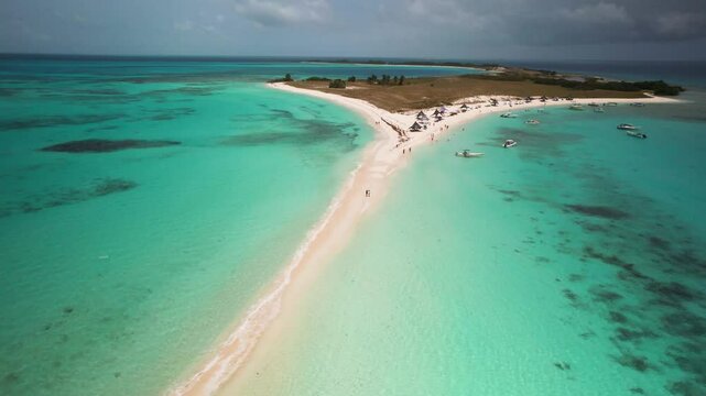 Drone shot couple standing together best tropical sandbar, Honeymoon concept. Los Roques