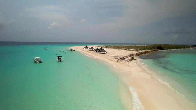 Aerial tracking beach camp on cayo de Agua island, Los Roques Archipelago