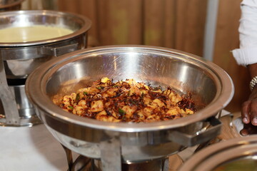 raditional Sri Lankan rice and curry, showcasing a variety of colorful vegetables, spiced curries, and fragrant rice. A perfect representation of Sri Lankan cuisine