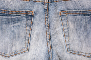 Fototapeta premium This is a CloseUp Image of the Back Pockets of Denim Jeans Showing Detailed Design Features