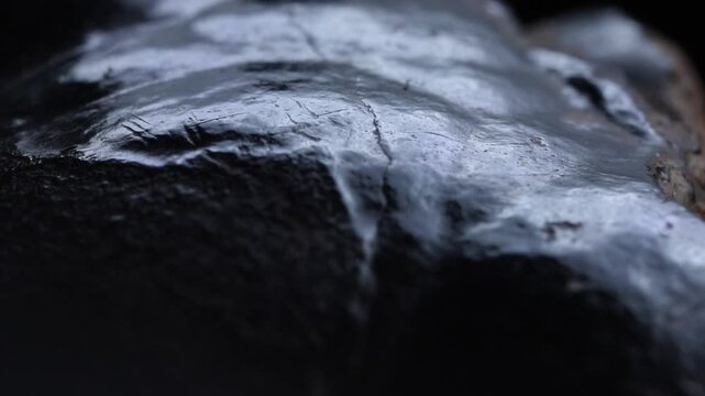 Raw iron ore extreme futuristic close up. Rotation movement