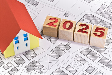 2025 REAL ESTATE PLANNING - Business concept in building activity and construction industry - New financial year and Budget 2025 concept with home model