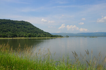 Fototapeta premium Beautiful water and reflections of mountains and bkue sky