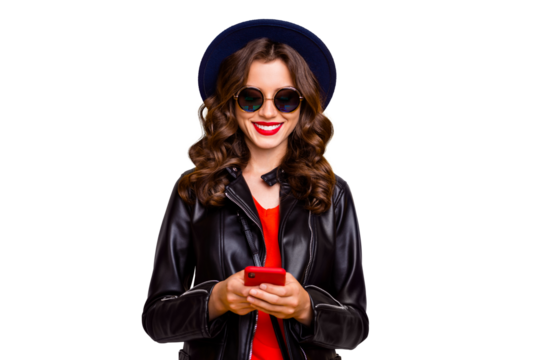 Portrait of charming cheerful positive girl use her cellphone comment text blog post wear black leather jacket isolated yellow color background