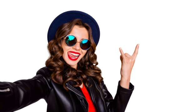 Close up photo of addicted funny heavy metal blogger enjoy party make selfie show two fingers horned signs wear black leather good look outfit isolated over yellow color background