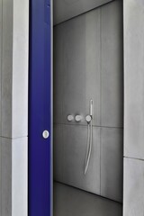 Discover a modern shower design with sleek fixtures and a minimalist look for elegance