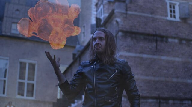 a sorcerer mage wizard witcher spellcaster casts fire and fireball in a movie-like scene episode