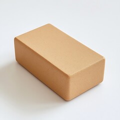 A yoga block on a white background.