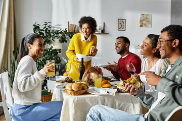 A group of friends shares laughter and gratitude during a festive Thanksgiving dinner at home.