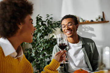 A group of friends sharing a delicious Thanksgiving meal filled with laughter and joy.
