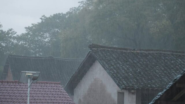 Rural tile house rain scene