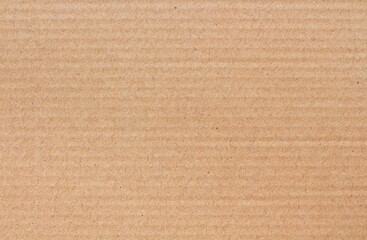 Fototapeta premium Cardboard sheet texture background, detail of recycle brown paper box pattern.