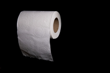 White Toilet Paper Rol on Black Background