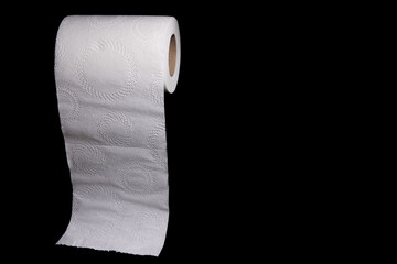 White Toilet Paper Roll With Circular Design Against Black Background