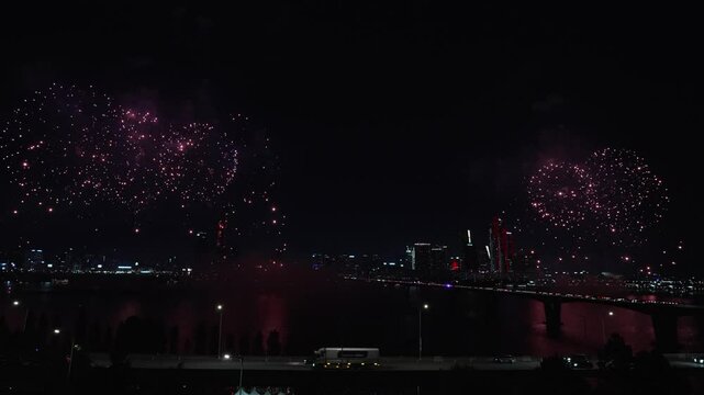Seoul International Firework Festival at the Yeouido Han River 2024, Colorful Fireworks Exploding in the Night Sky on Both Banks of Wonhyo Bridge