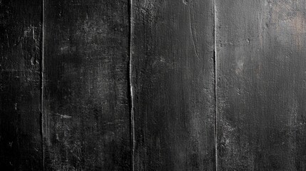 Obraz premium Grungy black chalkboard texture with scratches and faded marks, vintage and worn surface, perfect for backgrounds or educational designs