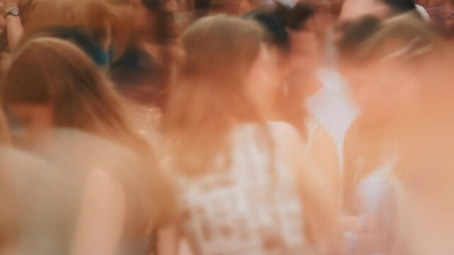 Close-up time-lapse unrecognizable blurry huge crowd of people crossing city street, busy crossroad fast motion, many pedestrians walking crosswalk. Rush hour crowded, people walk, blurred faces