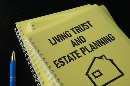 Living trust and estate planning is shown on the conceptual business photo