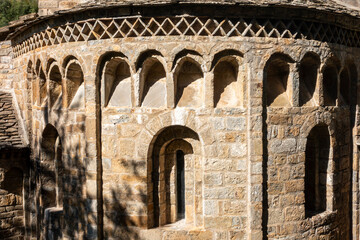 Lombard Romanesque apse of the church of the monastery of Santa Mar&iacute;a de Obarra from the 11th century. Huesca, Aragon, Spain.