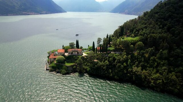 Como lake. beautiful lakes of northern Italy - romantic Lago di Como , most famous Villa del Balbianello. Tremezzina .aerial drone 4k hd video of iconic villa
