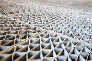 Metal industry steel grade sheet or floor grating with multicolored drops of paint macro closeup....
