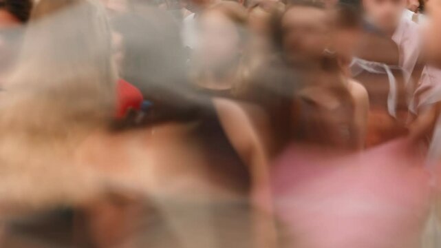 Close-up time-lapse unrecognizable blurry huge crowd of people crossing city street, busy crossroad fast motion, many pedestrians walking crosswalk. Rush hour crowded, people walk, blurred faces