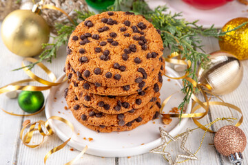 Traditional Christmas chocolate chips cookies, crispy american sweets for winter holiday and Santa treats