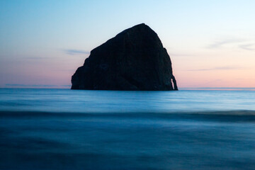 Famous Cannon Beach in Oregon Coast, USA. Great travel destination, Pacific ocean, high quality picture for download.